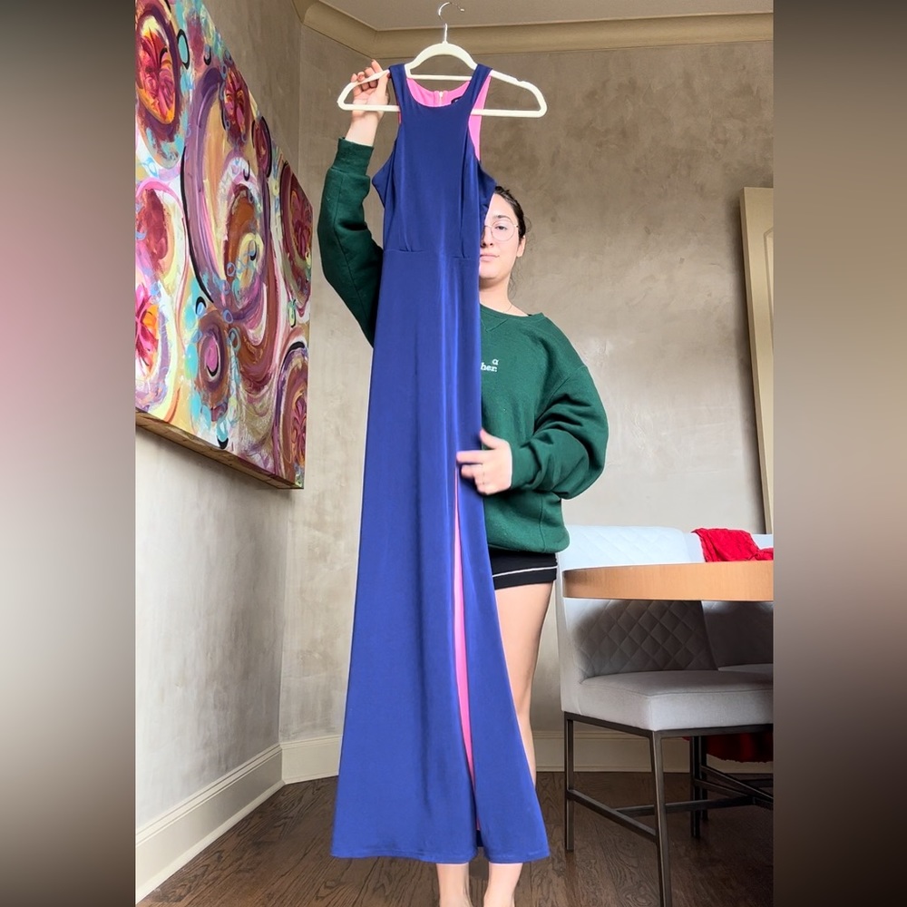 beautiful blue gown with high slit on one leg and a pink inside layer